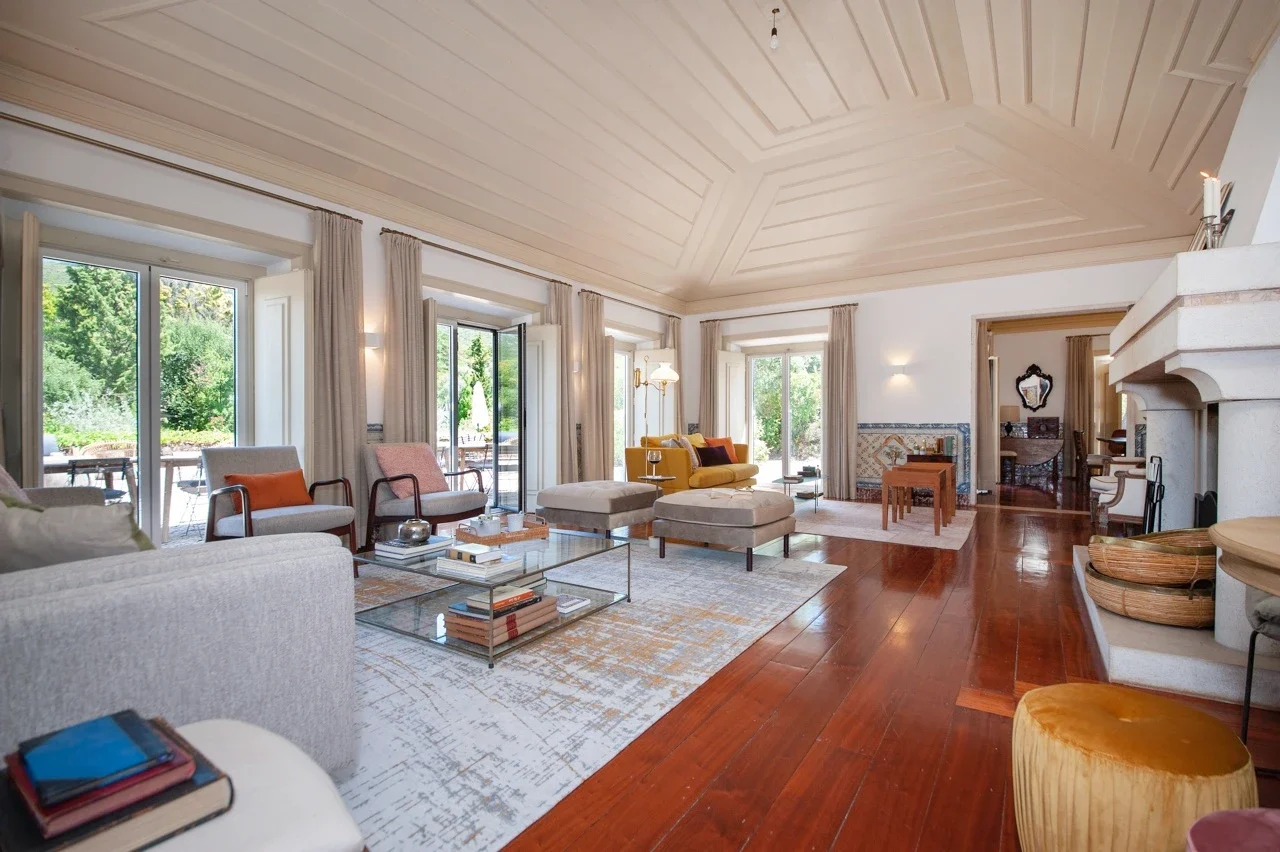 Wide-angle shot of the Manor house's large living room
